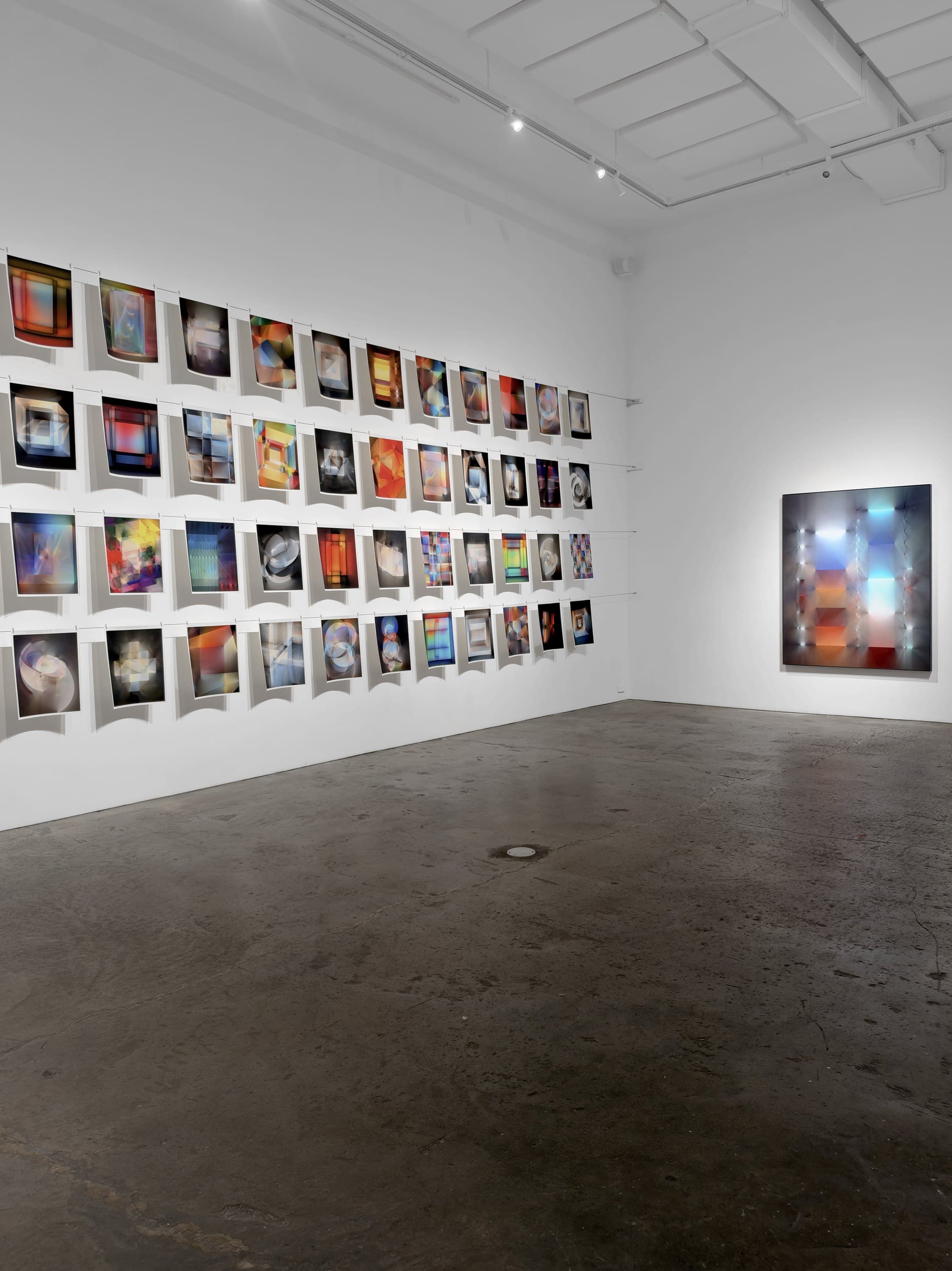 The wall of fifty-six daily sketches, with Lightfields #2 at the end of the room.
