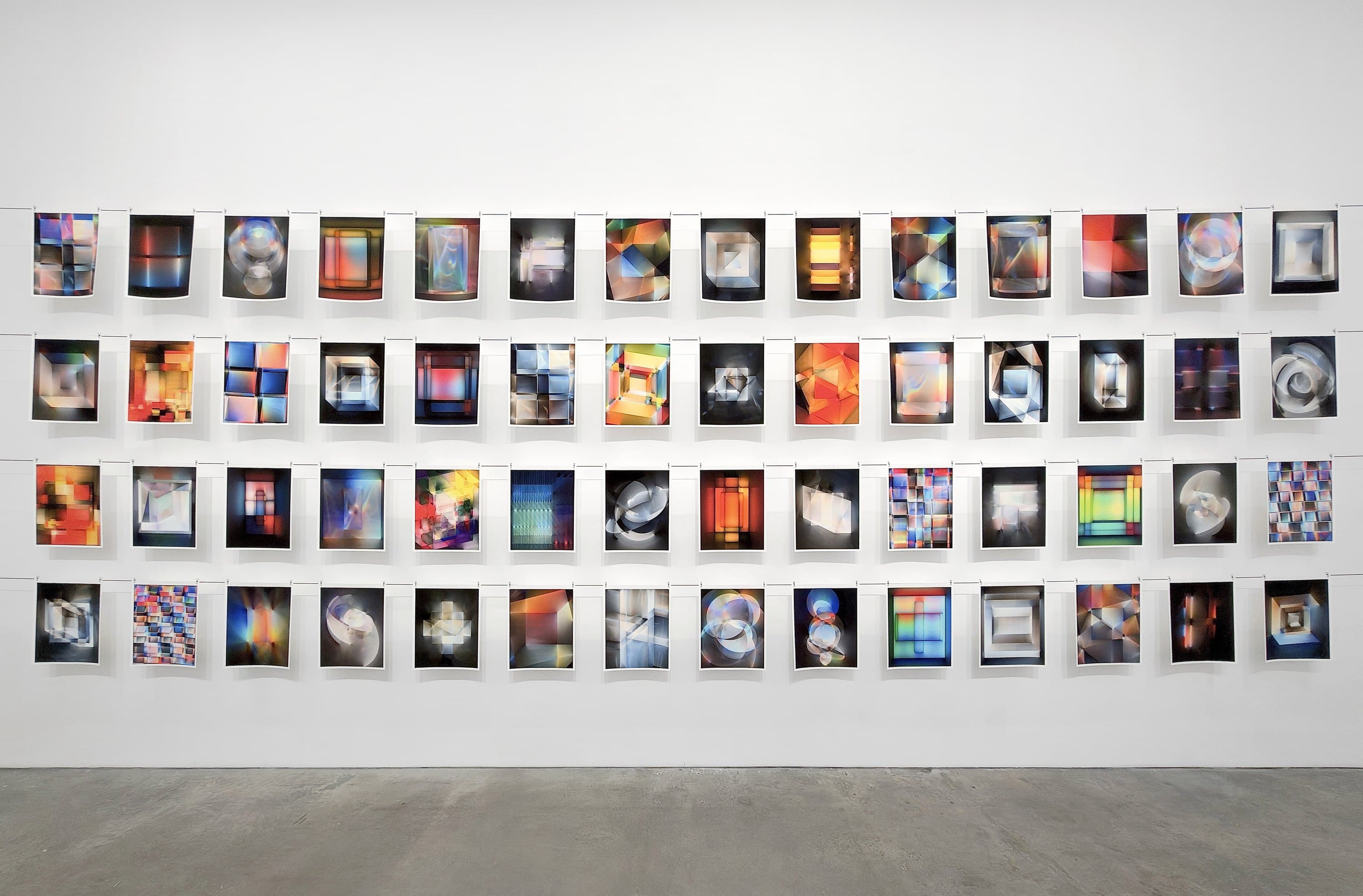 The fifty-six Lightfield Studies in four rows along the gallery wall.