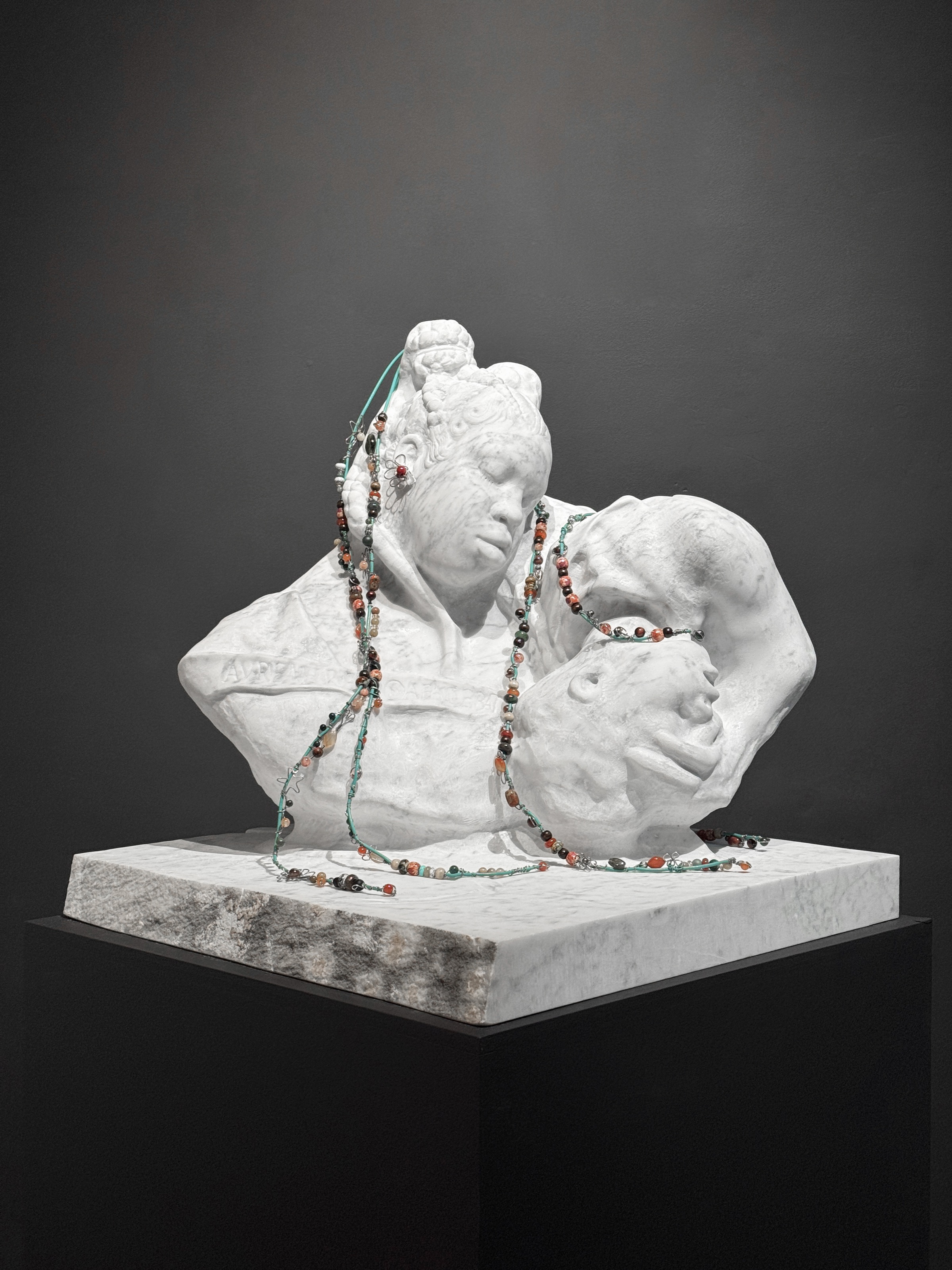 Mother / Child, carved in marble.